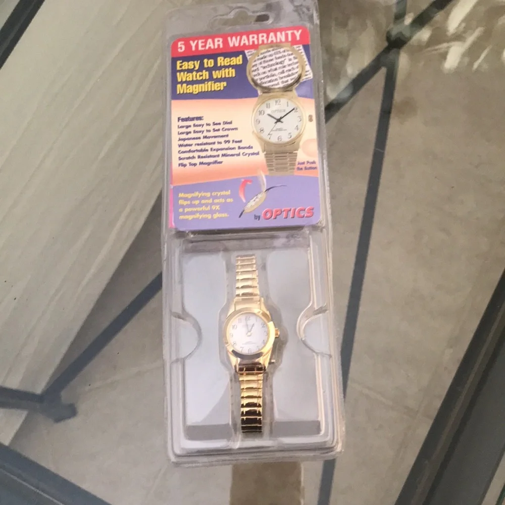 Optics quartz watch. Gold stretchy band, magnifying crystal NEW‎ classic
